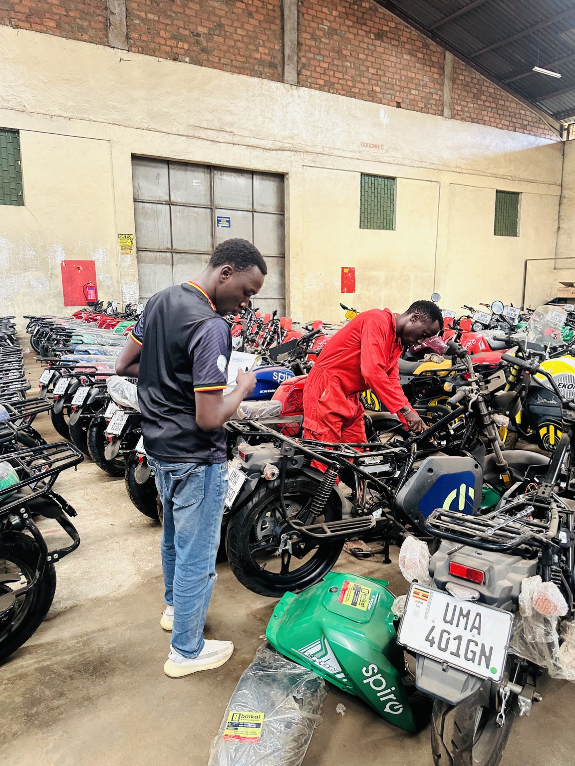 Our workshop team working on motorcycle installations