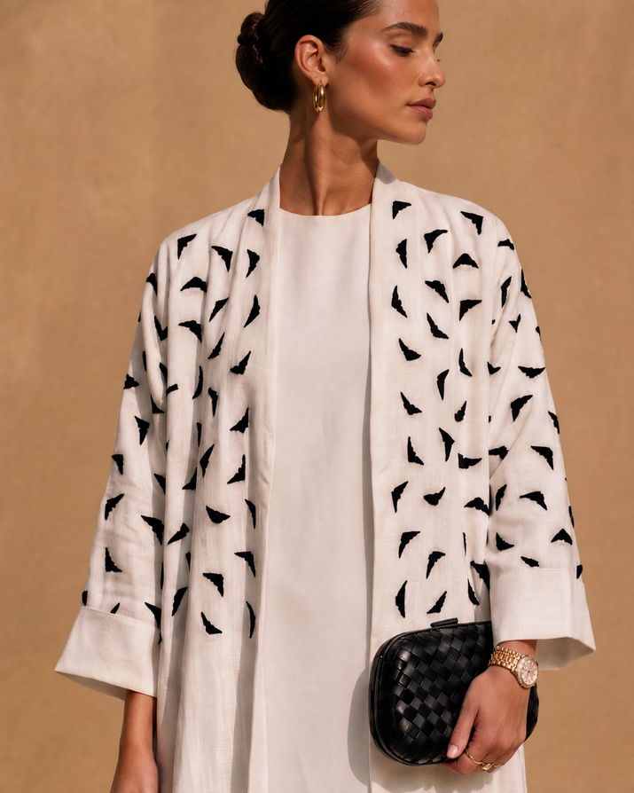White patterned abaya detail close-up — Lulu N Stitch